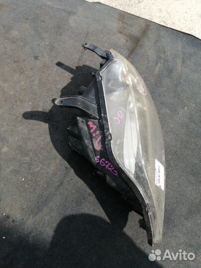 Фара левая Mazda Demio DY3W