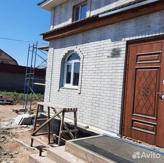 Сайдинг под камень и кирпич