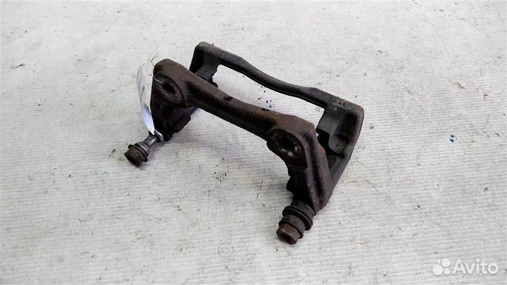 Скоба суппорта переднего Nissan Almera G15