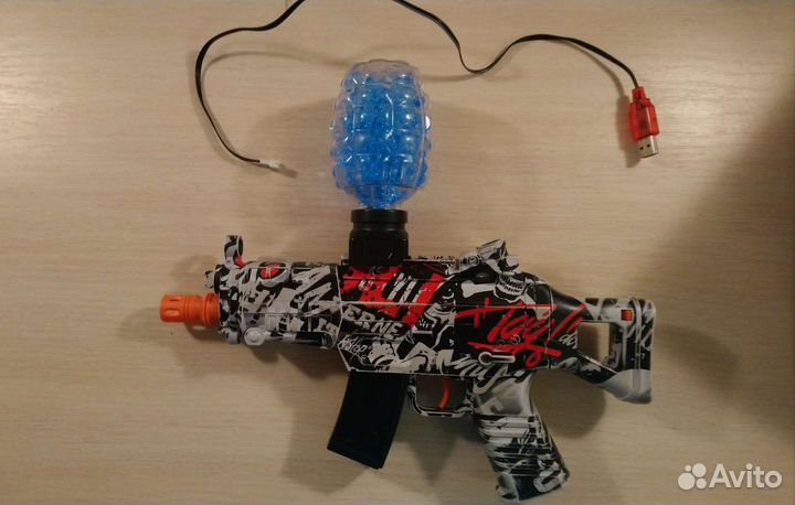 Игрушечный автомат с пульками орбиз