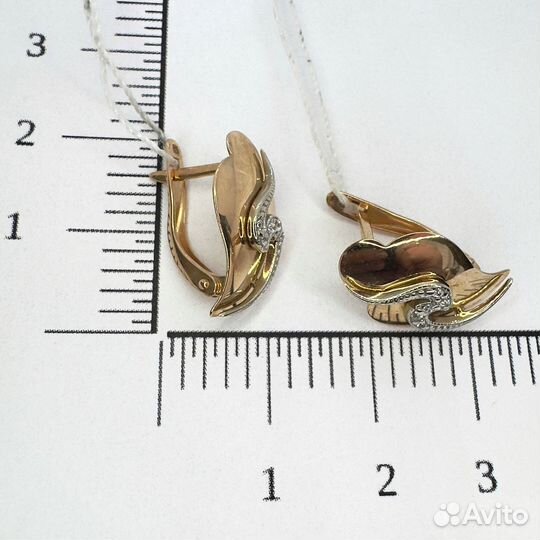 Золотые серьги с камнем