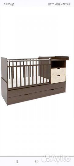 Детская кроватка с маятником