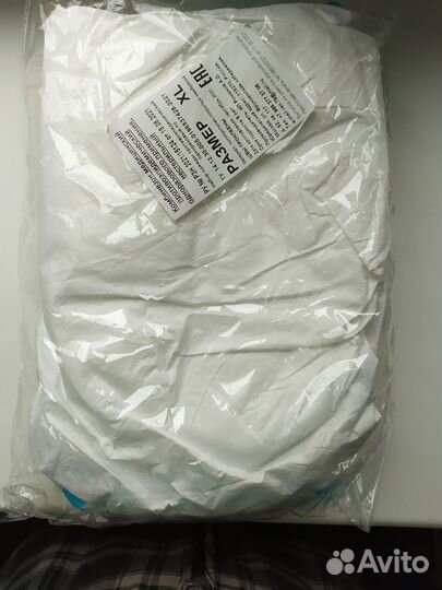 Комбинезон защитный одноразовый