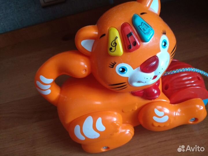 Игрушка-каталка музыкальная