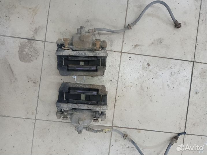 Суппорт тормозной передний nissan almera n16