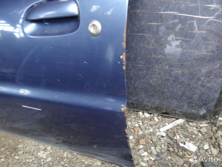 Дверь передняя левая Kia Rio I (1999–2002)