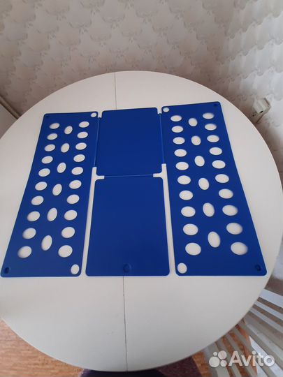 Приспособление для складывания одежды и белья