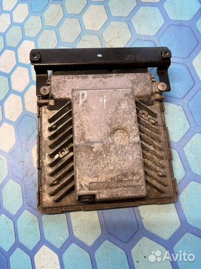 Блок управления двигателем 03G906018AS