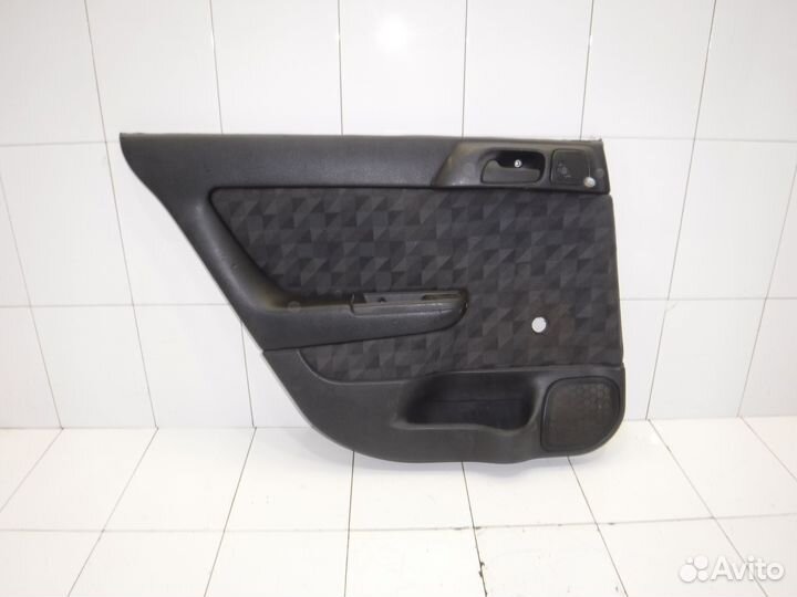 Обшивка двери задней Opel Astra G