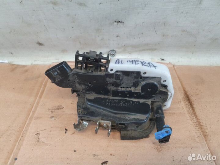 Замок двери передний левый Nissan Almera G15