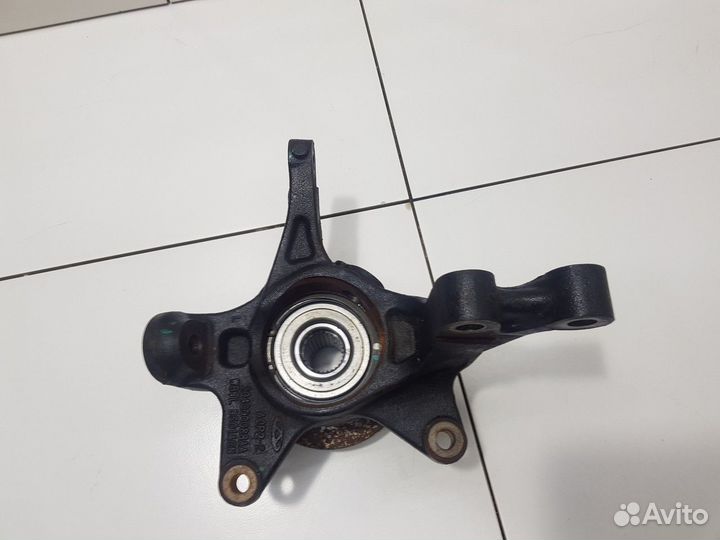 Кулак поворотный передний левый