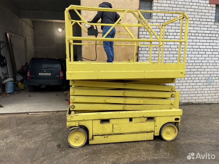 Ножничный подъемник 12 метров