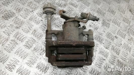 Суппорт тормозной задний левый opel astra J (LDN31