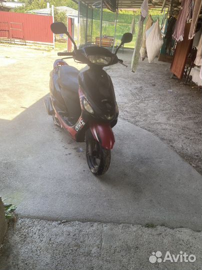 Скутер омакс