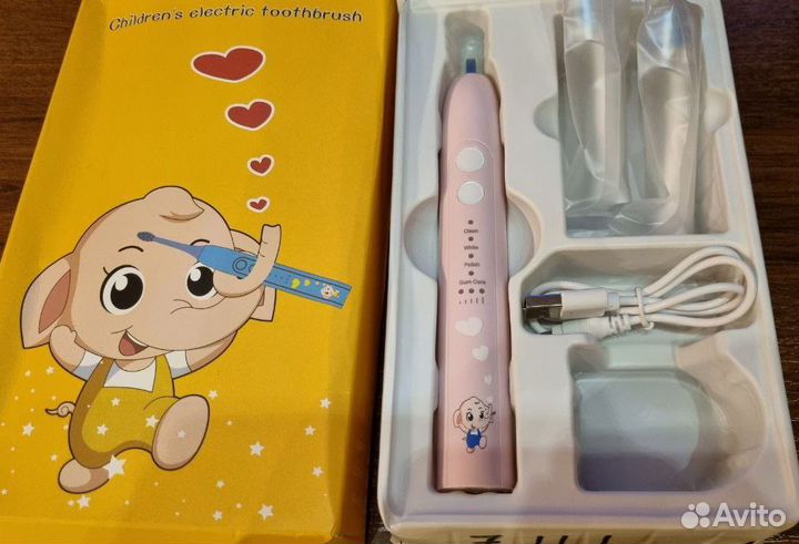 Электрическая зубная щетка