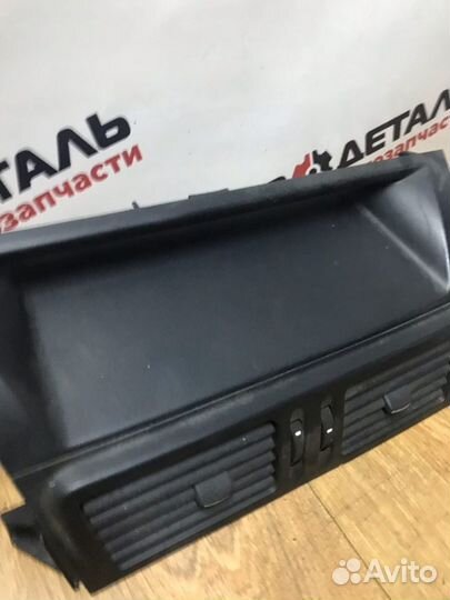 Дефлектор воздушный центральный Geely Emgrand X7