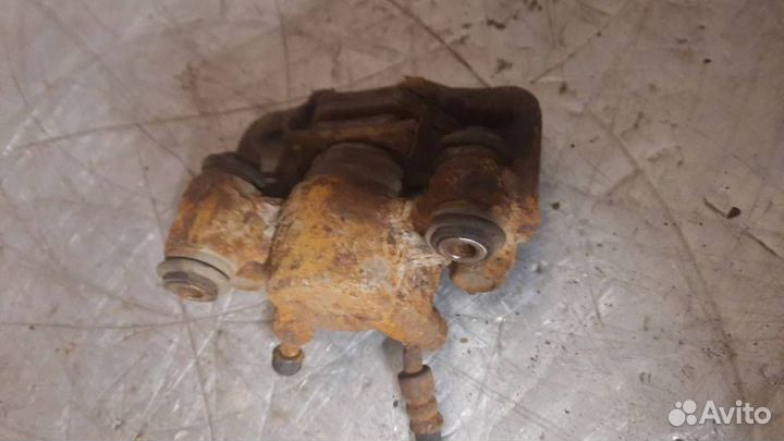 Суппорт тормозной задний правый Toyota 4773013020