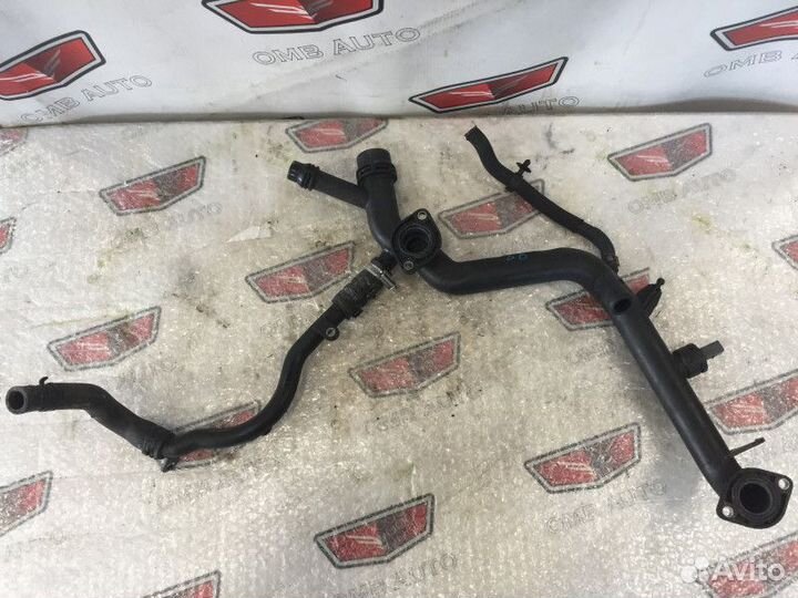 Патрубок системы охлаждения Ауди А6 C6