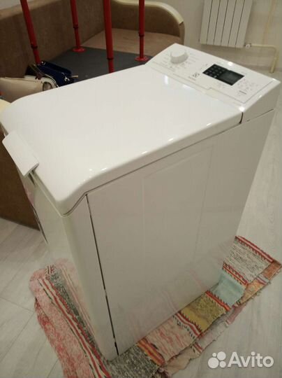 Стиральная машина с вертикальной загрузкой