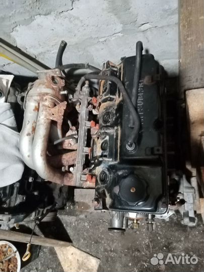 Двигатель на mitsubishi lancer 9 1 6 4g18