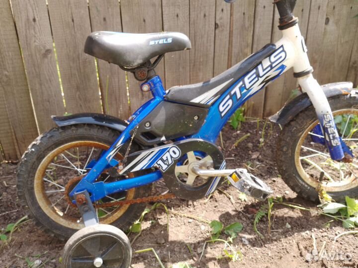 Детский четырёх колёсный велосипед