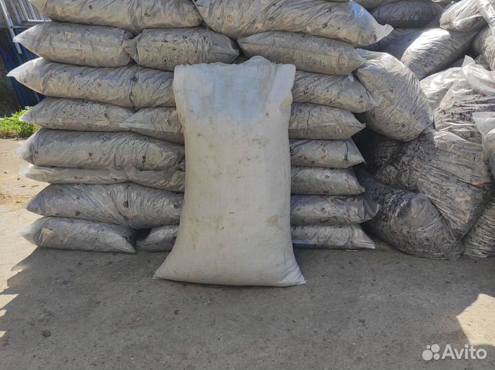 Скорлупа кедрового ореха в мешках