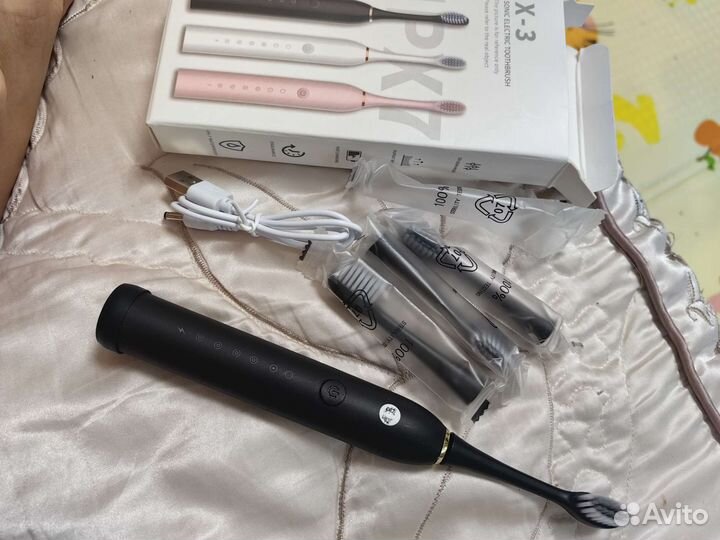 Электрическая зубная щётка