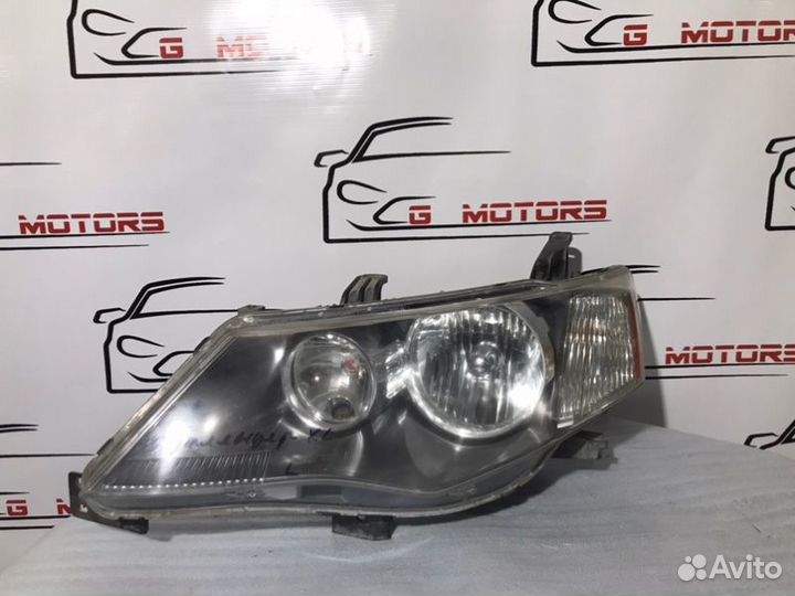 Фара ксеноновая левая Mitsubishi Outlander XL