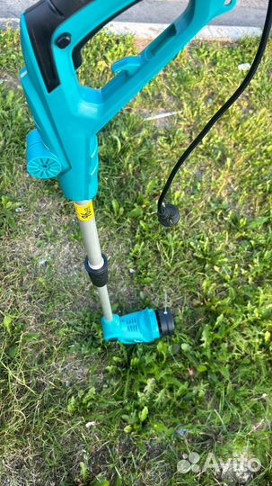 Триммер электрический новый