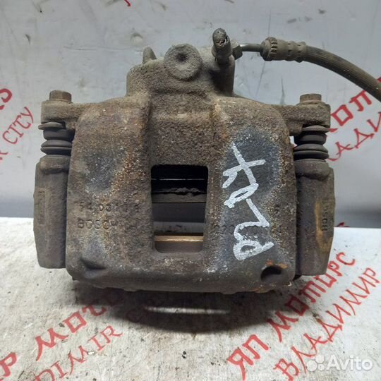 Суппорт тормозной передний левый Peugeot 207 EP6