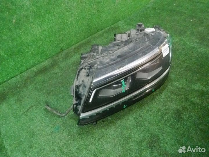 Фара левая Volkswagen Tiguan