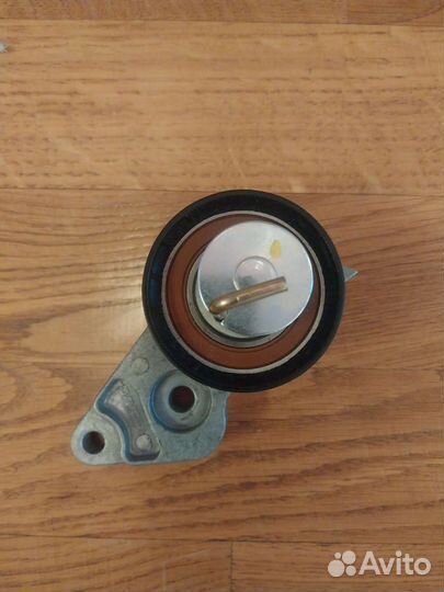 Натяжной ролик ремня грм Ford