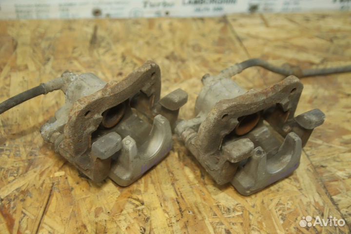 Суппорт тормозной зад Тойота Камри 40