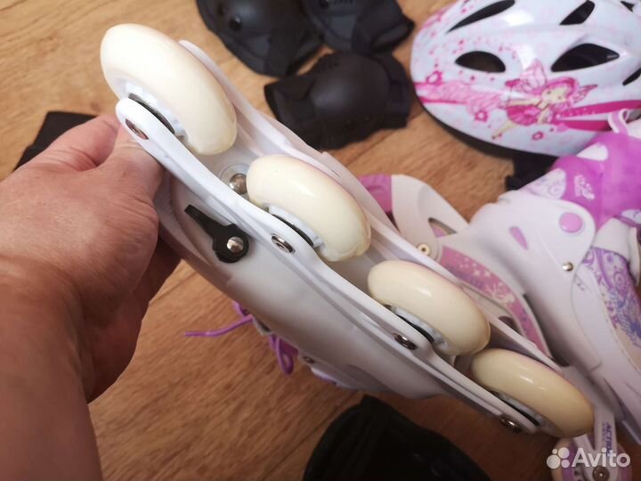 Роликовые коньки