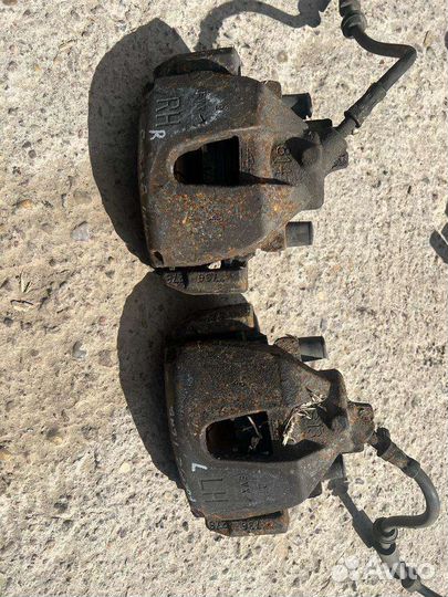 Суппорт левыи правыи передний Форд Фокус 2