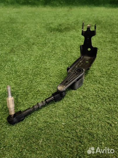 Датчик высоты подъема передний левый Volkswagen