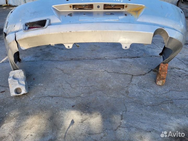 Бампер задний на Nissan Almera B10