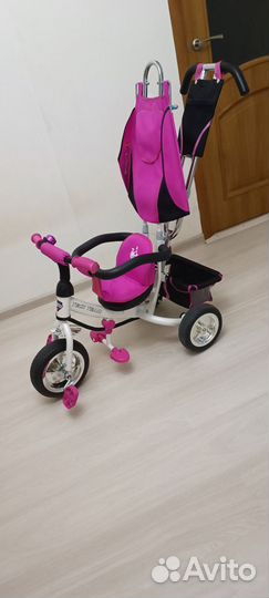 Трехколесный велосипед с родительской ручкой