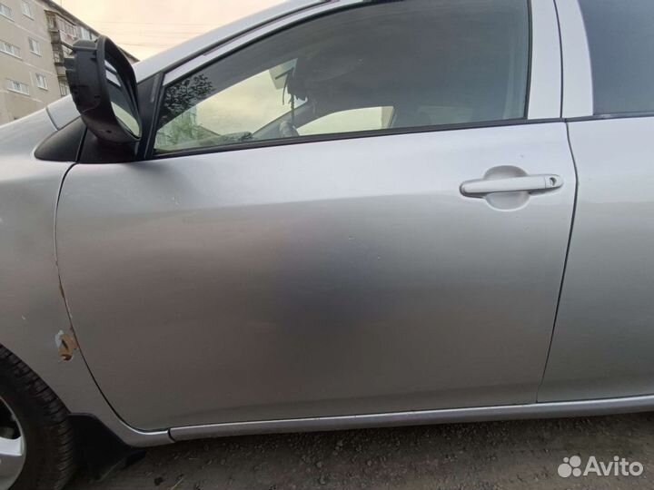 Продам левую и правую переднюю дверь тоета королла