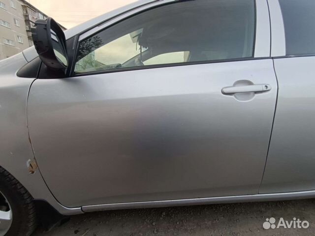 Продам левую и правую переднюю дверь тоета королла