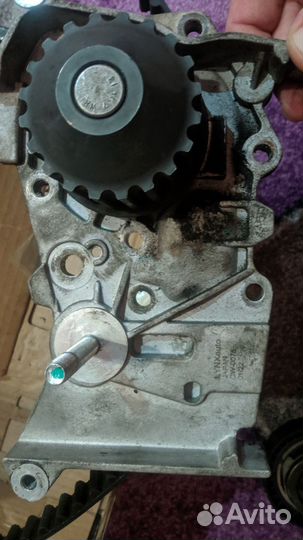 Комплект грм с помпой Логан 10г/два ролика