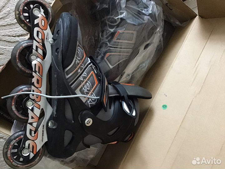 Роликовые коньки