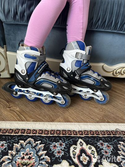 Роликовые коньки