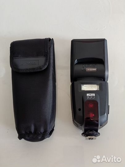 Вспышка Metz для фотоаппарата Canon