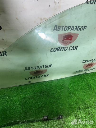 Стекло двери переднее левое Nissan Terrano D10