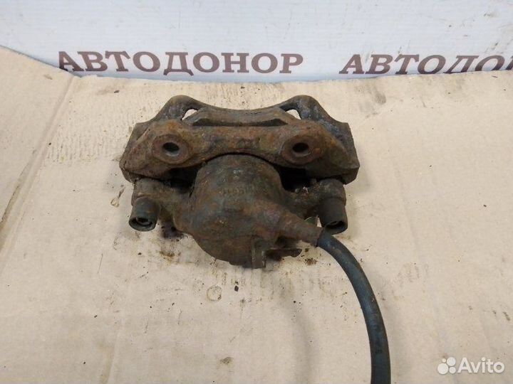 Суппорт тормозной передний левый Audi 100 45