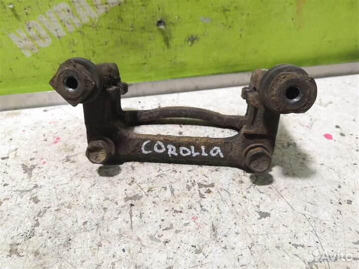 Скоба суппорта заднего Тойота Королла Е120