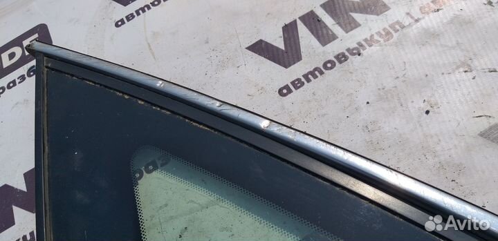 Стекло кузовное заднее левое Nissan Almera G15