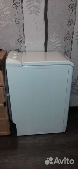 Стиральная машина с вертикальной загрузкой