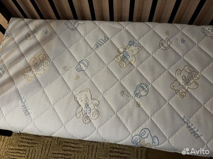 Детская кроватка с универсальным маятником